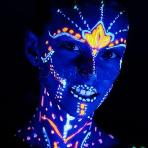 stock-photo-closeup-portrait-of-beautiful-girl-with-ultraviolet-paint-on-her-face-girl-with-neon-makeup-in-color-light-257158